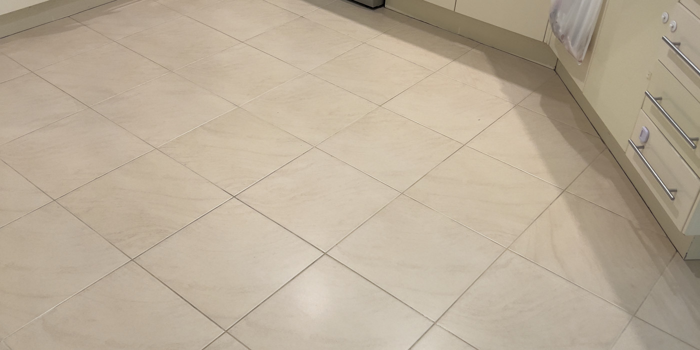 Kitchen cabinetry and tiled floor, a standard inspection checkpoint
